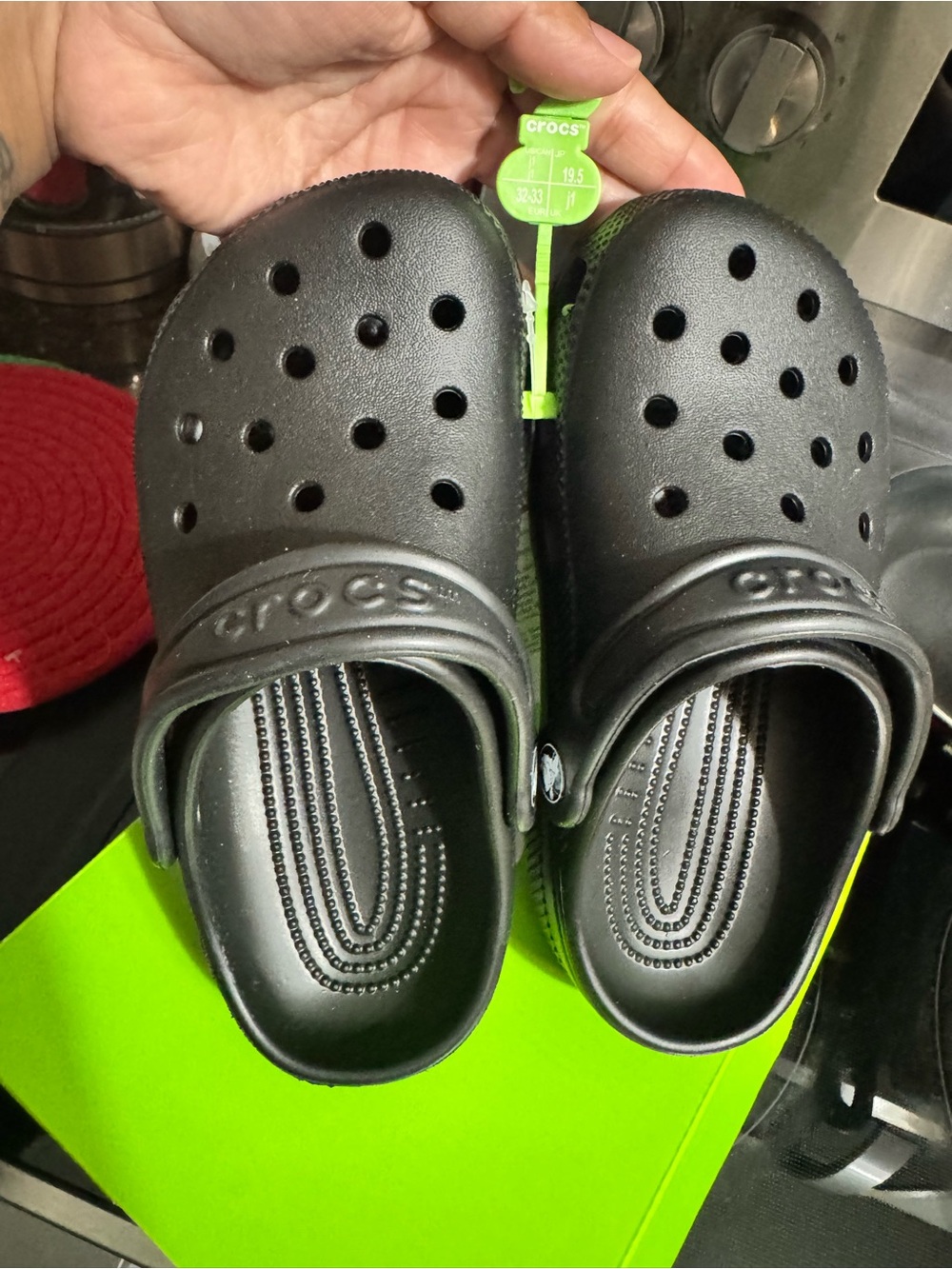 CROCS Kids Classic Clog in Black with Green Tag